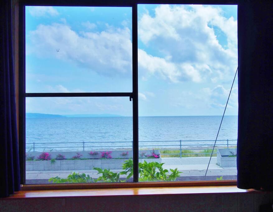 佐渡 ビーチまで0分 1客のみ オーシャンビュー Beach Side House ウッドデッキ Sado Esterno foto