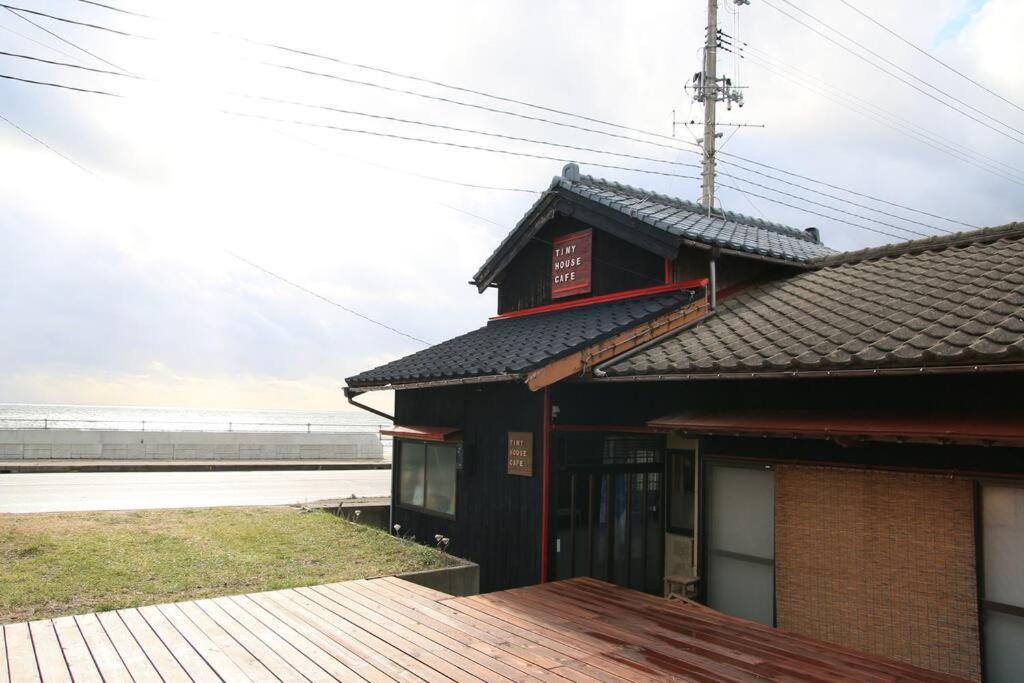 佐渡 ビーチまで0分 1客のみ オーシャンビュー Beach Side House ウッドデッキ Sado Esterno foto